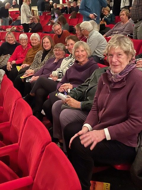 Row of ladies sitting at Drury Lane theatre