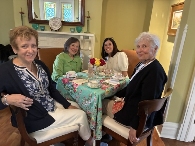 Ladies posing at tea party